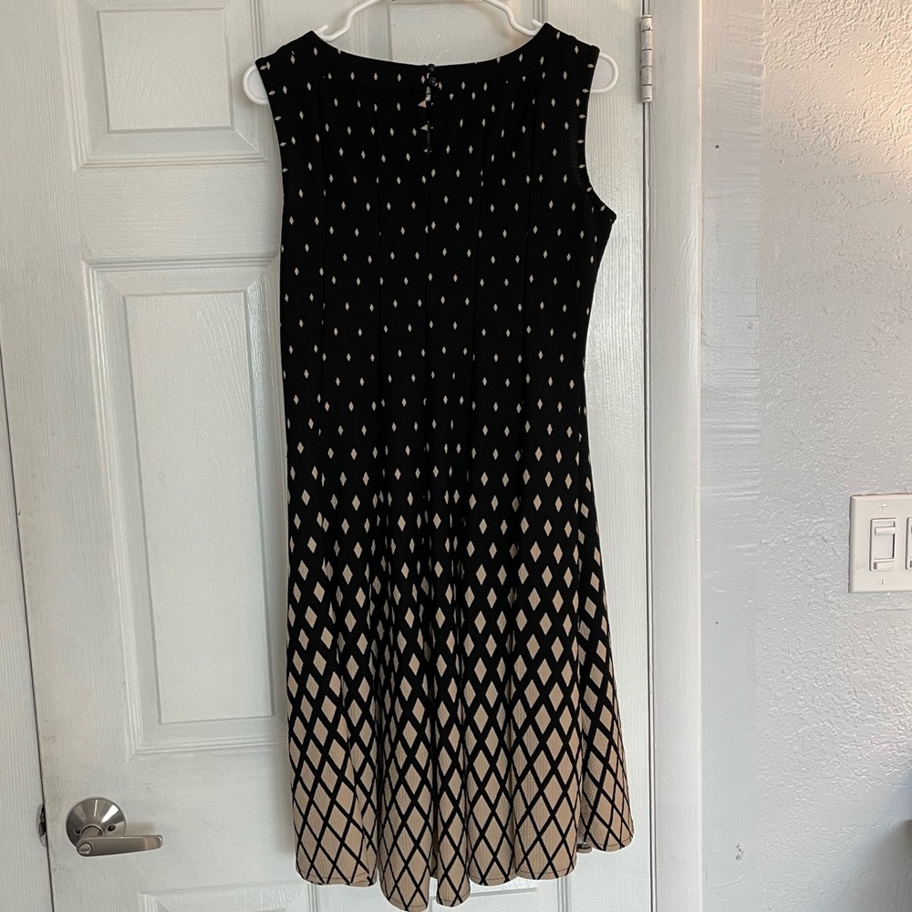 Haani Black and tan dress in size Petite Large